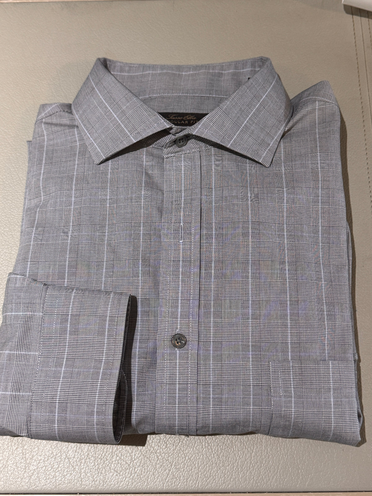 A folded gray long-sleeve dress shirt with a subtle white windowpane plaid pattern, displayed on a light beige textured surface.
