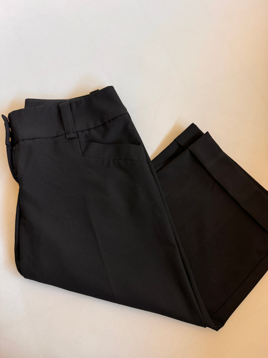 Pants folded on a white background