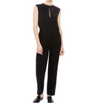 Black sleeveless jumpsuit worn by a person on a white background