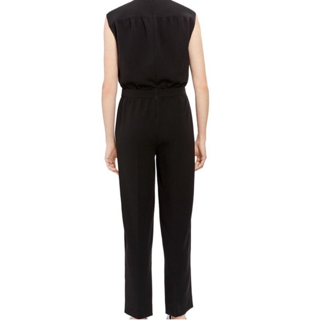 Black sleeveless jumpsuit on a white background