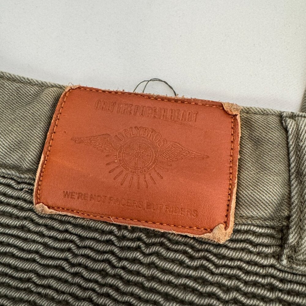 Close-up of a leather patch with branding on a textured surface