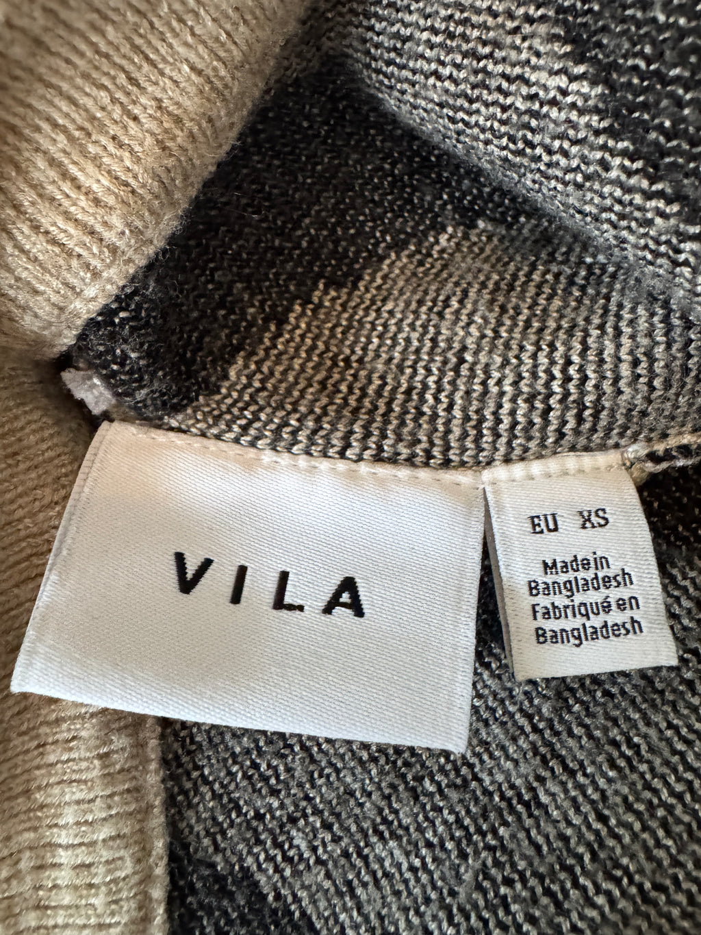 Close up of Vila Brand and Size Label