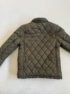 Quilted jacket on a white background