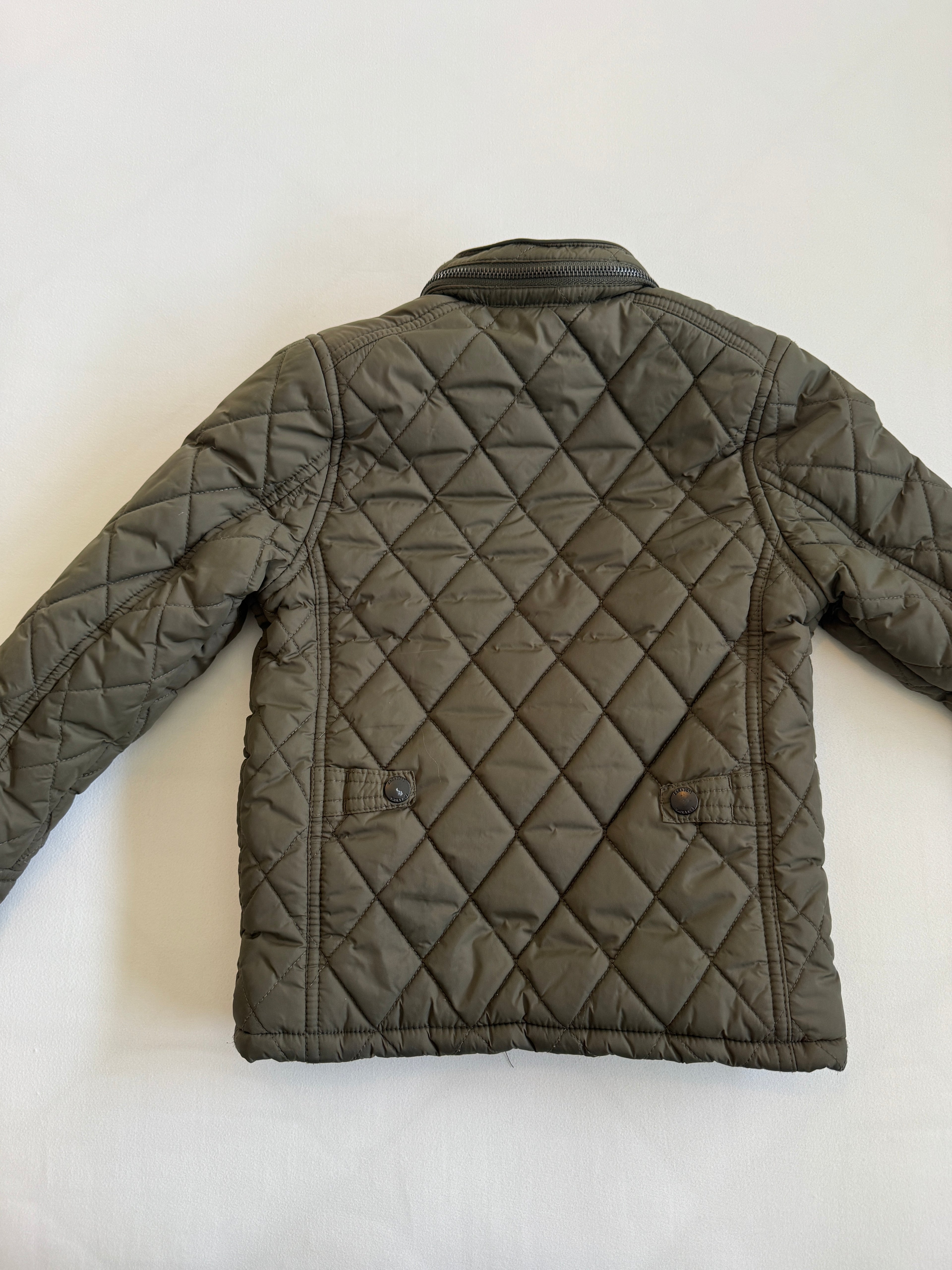 Quilted jacket on a white background