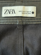 Zara label on a dark fabric background