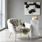 Chico's Dolman Animal Print Cinch Waist Top in sophisticated setting