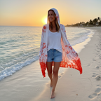 Lifestyle beach scene with cardigan