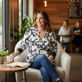 Lifestyle image of woman wearing Flow! black and white V-neck top
