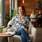 Lifestyle image of woman wearing Flow! black and white V-neck top