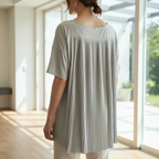 Lifestyle image showcasing back pleats on Chico's top