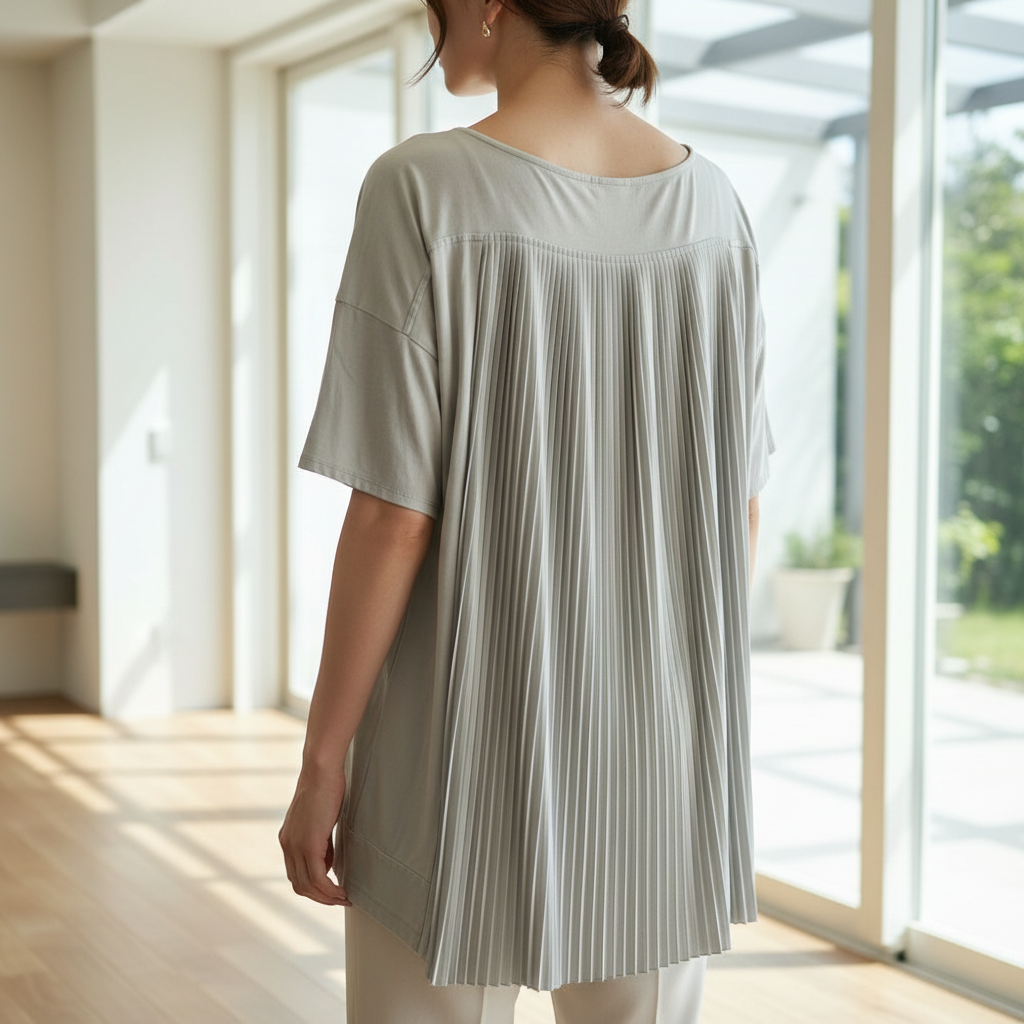 Lifestyle image showcasing back pleats on Chico's top