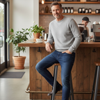 Mid-age man wearing dark blue jeans at coffee bar