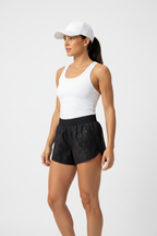 Studio Model Shot - Solid Black Shorts White Background