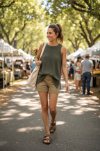 Woman in olive green sweater lifestyle shot