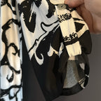 Flow!  Great black and white V-neck top - Sz XL